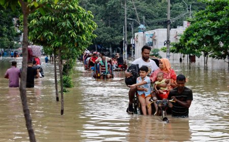 Heavy downpour floods streets across Dhaka.