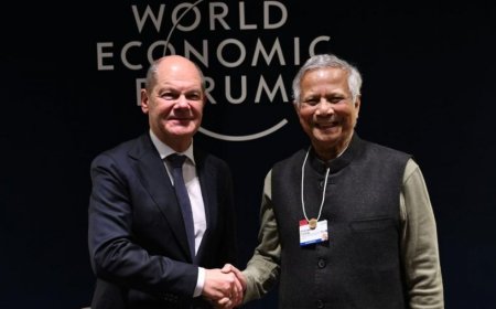Dr. Yunus kicks off Davos activities with a meeting with the German Chancellor