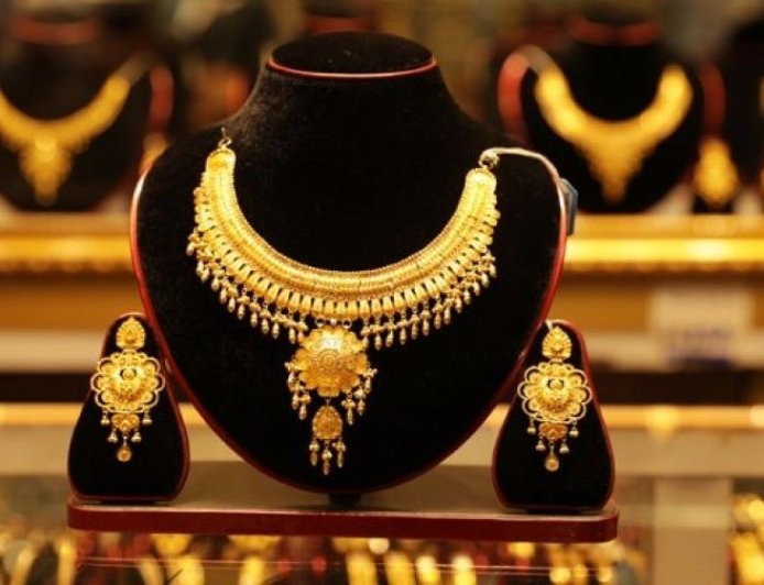 Gold prices plunged again in the domestic market, falling by Tk14,813 per bhori