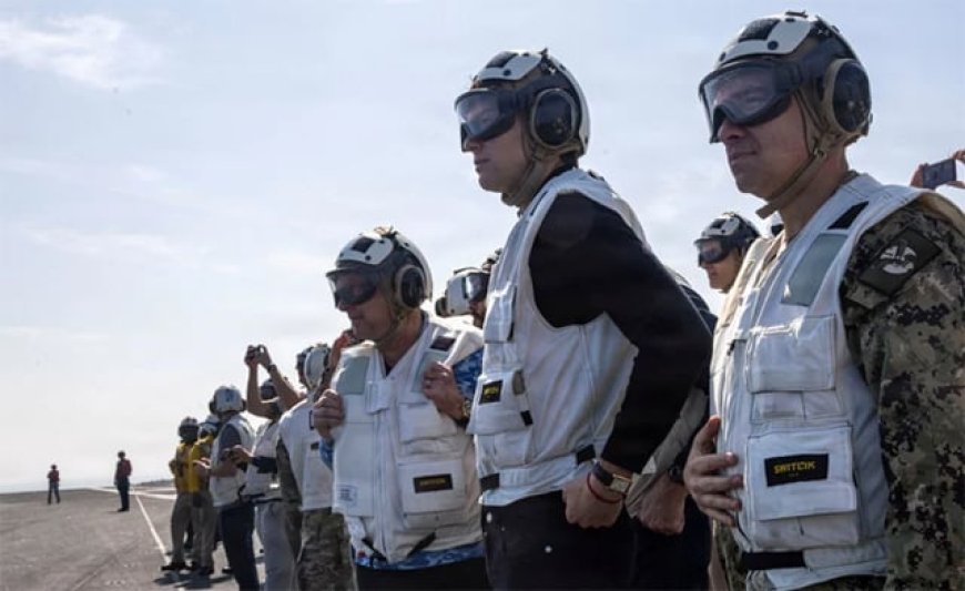 Top Trump administration Iran negotiators visit US aircraft carrier in the Middle East