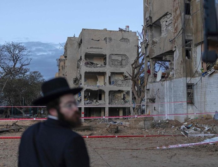 Iran strikes near Israeli nuclear facility, launches long-range missiles for the first time