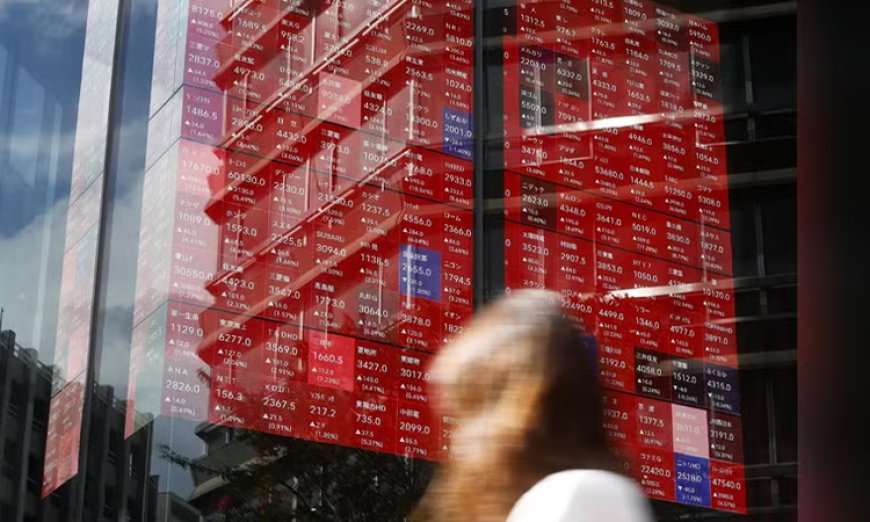 Asian Stocks Fall Following US Market Losses and Iran Strikes