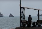 Iran retaliates after first US strikes in a month